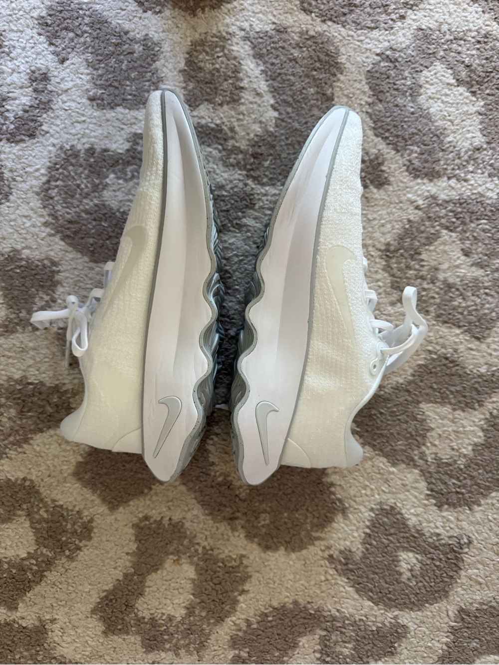 Nike White Women's Running Sneakers with Silver Swoosh